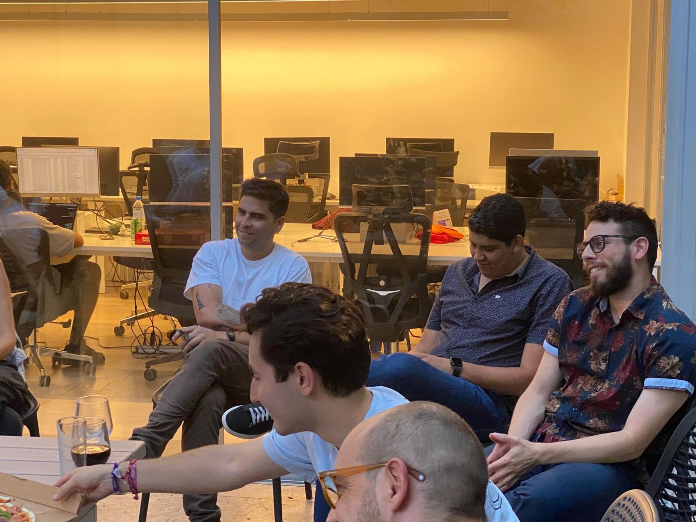 People talking in a circle at the meetup