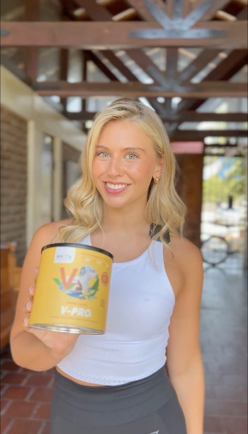 A model holding Brota V-PRO
