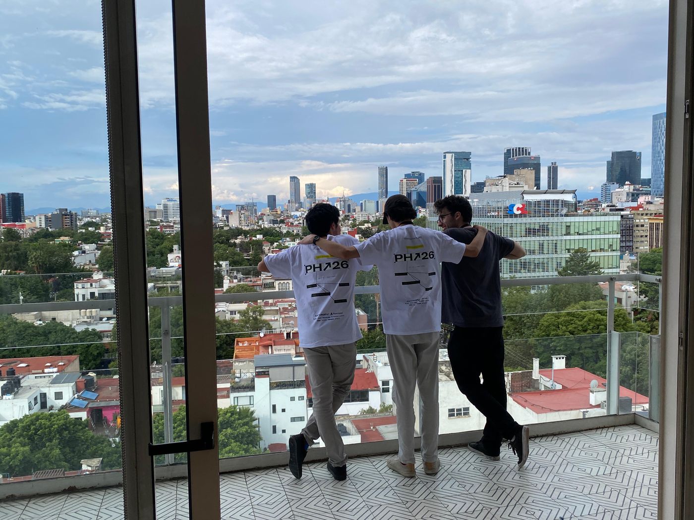 Staff in PH26 shirts looking over Mexico City