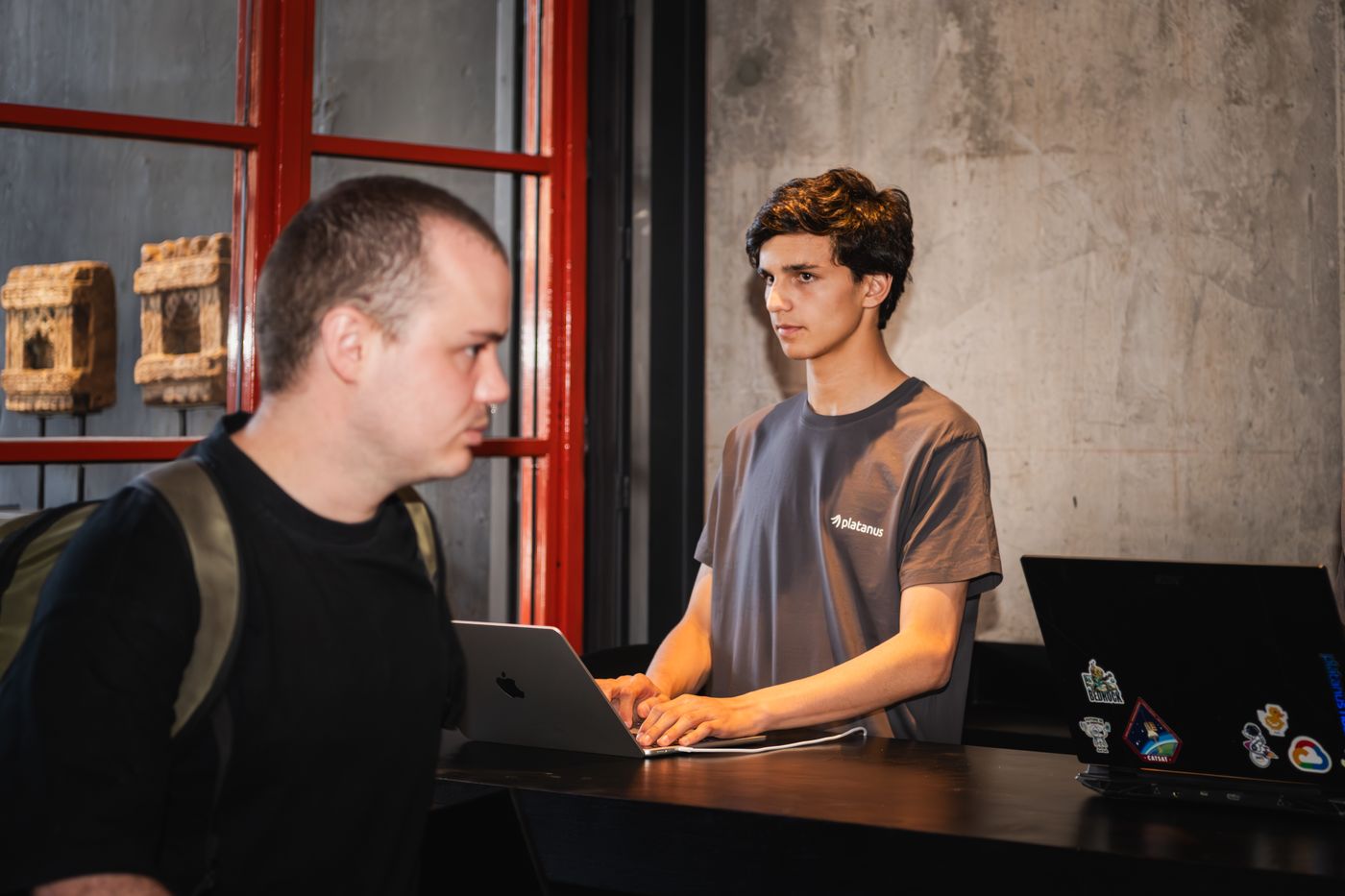 Vicente at the Platanus Hack registration desk